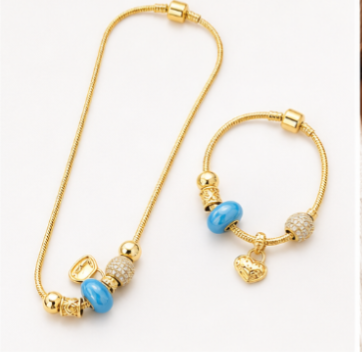 Gold Charm Necklace & Bracelet Set – Blue Stone Jewelry Set